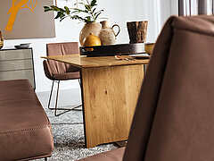 Detail / T 2050: Dining table 7883-79-080, character oak, oiled, metal brackets, powder-coated in bronze