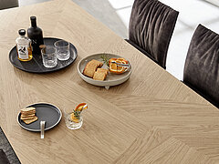 Dining table 353 with flat butterfly pull-out frame, oak frame E11/metal A01 black, tabletop in oak E11 mosaic, approx. 100 x 200 (300), H 76 cm