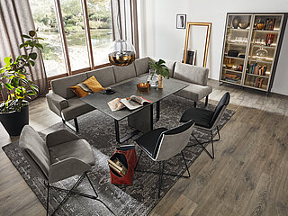 Corner bench (comprising: add-on corner E16RG, bench element B190L), approx. 273 x 191, H 84 cm, S 37/21 grey fabric (SK 20) with contrasting seams, metal runners F Q7 in M99 black